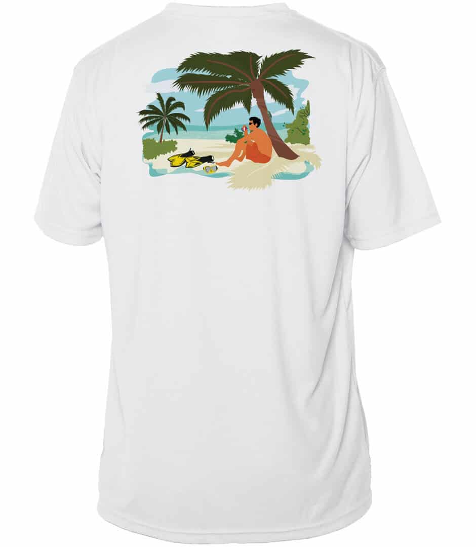 Relaxed man on beach with palm trees and ocean in background, wearing Key West sun shirt.
