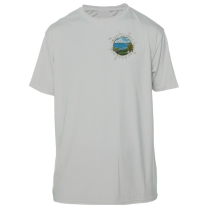 A UV shirt with an image of the ocean and mountains.