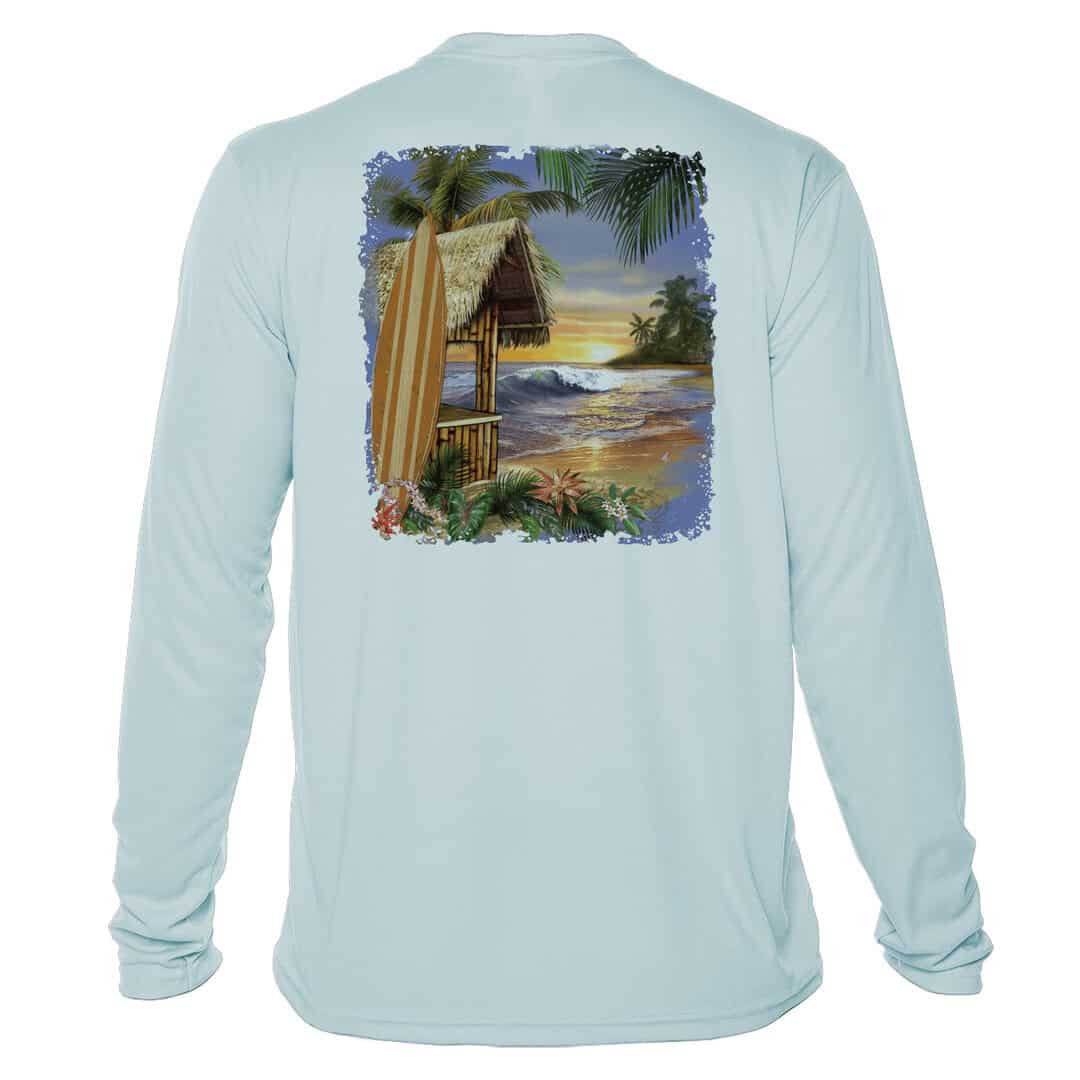Bright blue long sleeve sun shirt with tropical beach scene print.