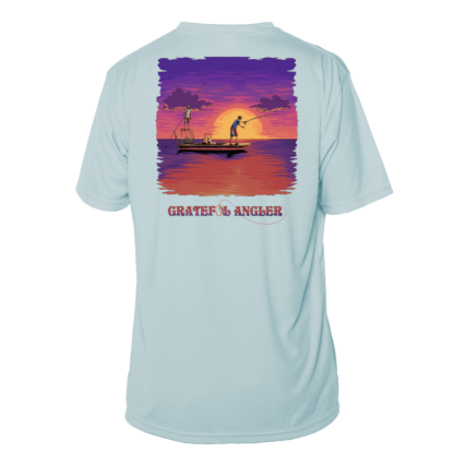A Grateful Angler Skeleton Anglers Short Sleeve UV Shirt with an image of a boat at sunset.