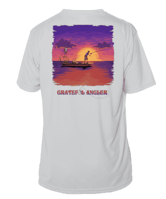Skeleton angler fishing at sunset on a UV-protected shirt.