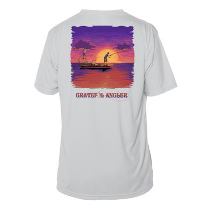 A Grateful Angler Skeleton Anglers Short Sleeve UV Shirt with an image of a man fishing at sunset.