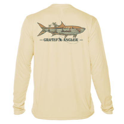 A long-sleeved Grateful Angler Keys Tarpon UV Shirt with an image of a shark on it.
