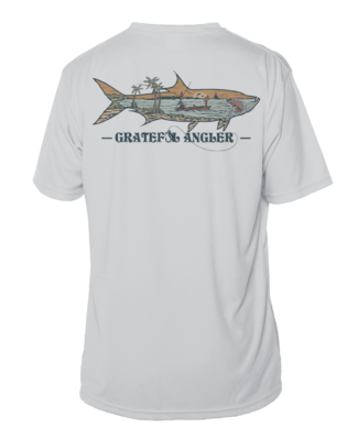 A Grateful Angler Keys Tarpon Short Sleeve UV Shirt with an image of a shark on it.