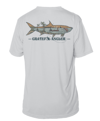 A Grateful Angler Keys Tarpon Short Sleeve UV Shirt with an image of a shark on it.