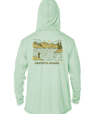 A Grateful Angler Mountain Fishing UV Hoodie with a picture of a lake and mountains.