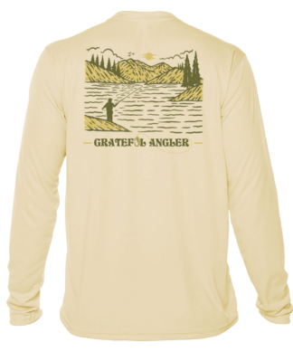 back of pale yellow Grateful Angler Mountain Fishing UV Shirt showing a person fishing along the banks of a mountain lake