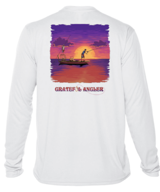A white long-sleeve Grateful Angler Skeleton Anglers UV Shirt featuring an image of a boat at sunset.