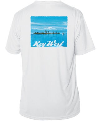 Bright white T-shirt featuring a scenic Key West island view with palm trees and ocean.