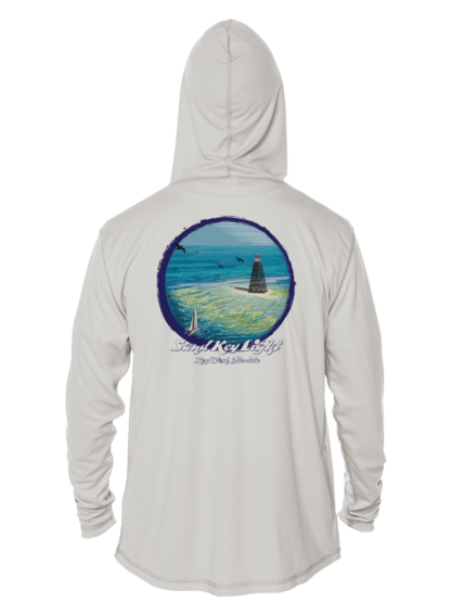 A white rash guard with an image of the ocean and a boat.