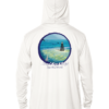 A white rash guard with an image of the ocean and a boat.