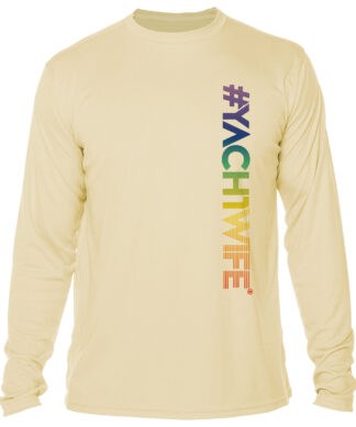 Bright yellow UPF 50+ long sleeve shirt with "#YACHTWIFE" text in rainbow colors. Perfect for sun pr.