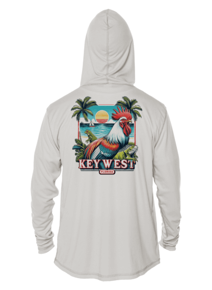 A white rash guard hoodie with an image of a rooster and palm trees.