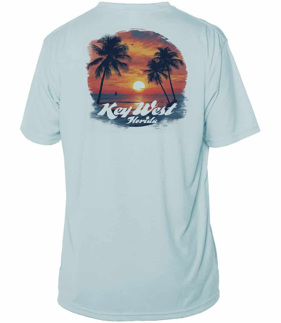 Sun shirt with palm trees and sunset graphic, UPF 50+ protection, Arctic Blue, XS.