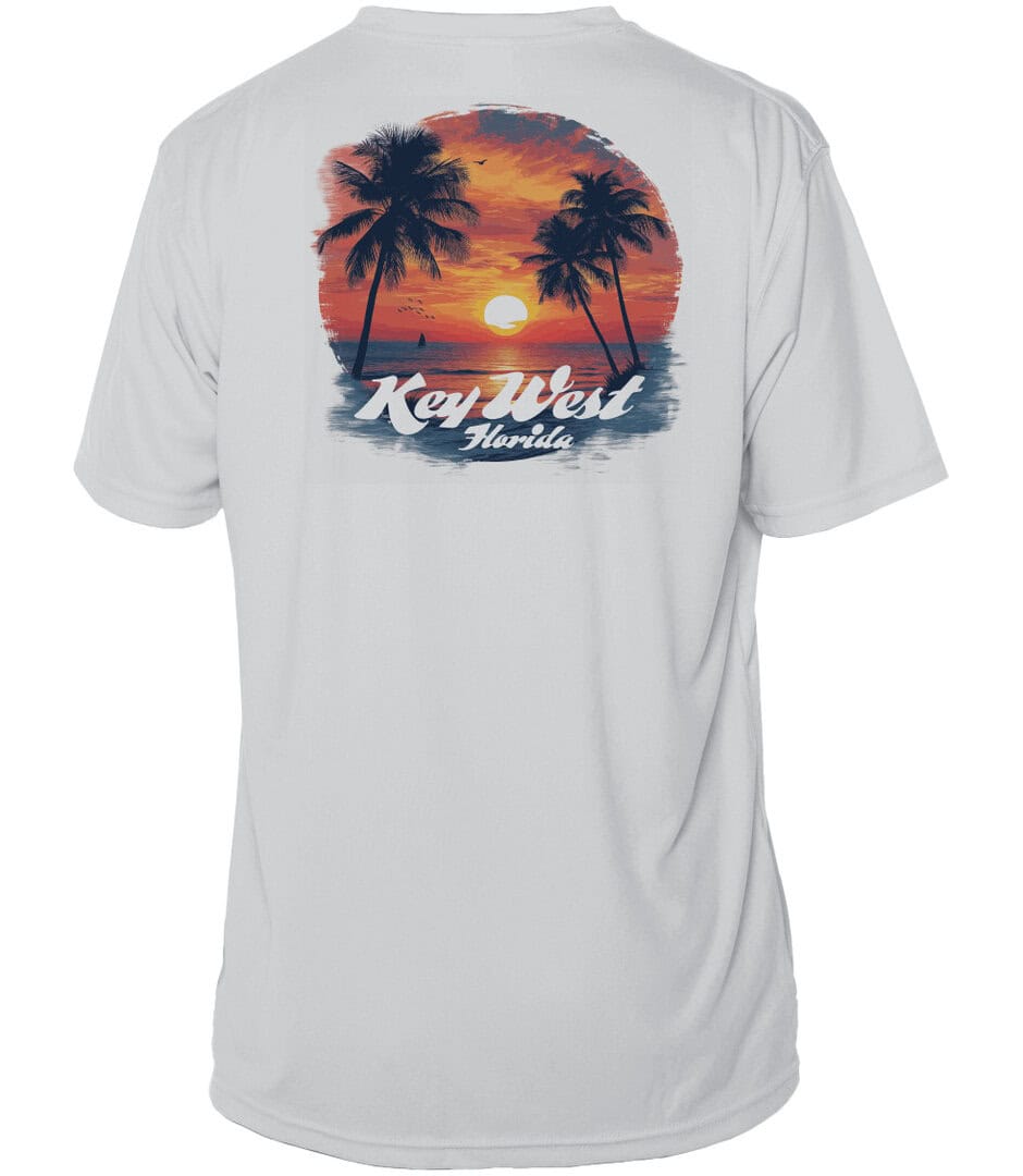 Sunset palm trees on a Key West shirt with UPF 50+ protection, perfect for sunny days.
