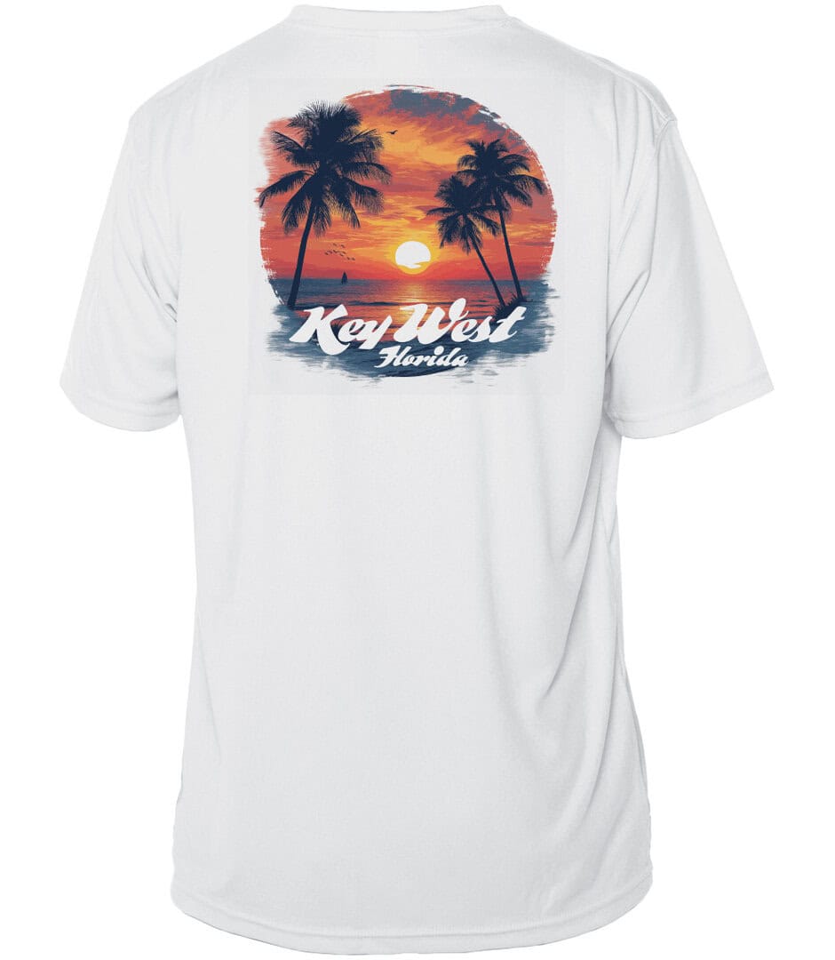 Key West sunset shirt with palm trees and vibrant sunset design, UPF 50+ protection.