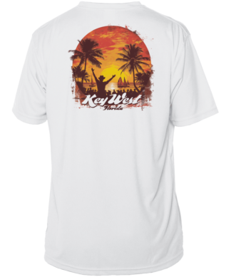 A sun protective swim shirt, featuring a mesmerizing image of a sunset and palm trees.