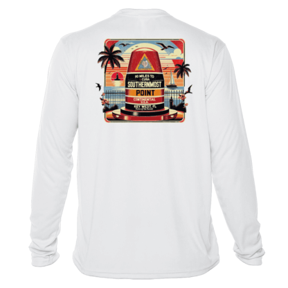 A white long-sleeve swim shirt with an image of a beach and palm trees.