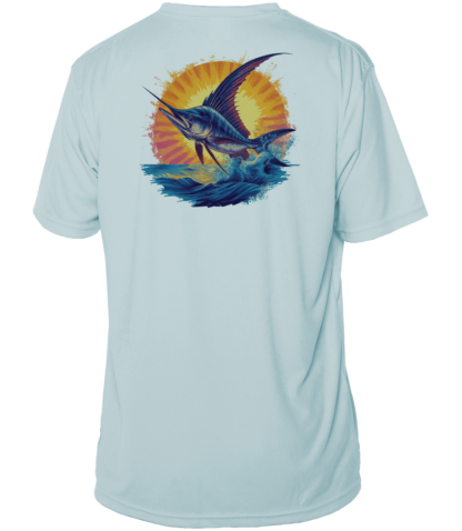 A men's UV fishing shirt in light blue featuring a marlin design against a stunning sunset backdrop.