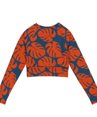 Bright Monstera leaf print UPF 50+ recycled crop top for sun protection. Perfect for beach days and.
