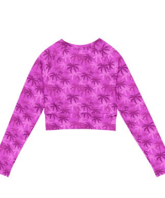 Pink palm print long-sleeve crop top with UPF 50+ sun protection, eco-friendly fabric.