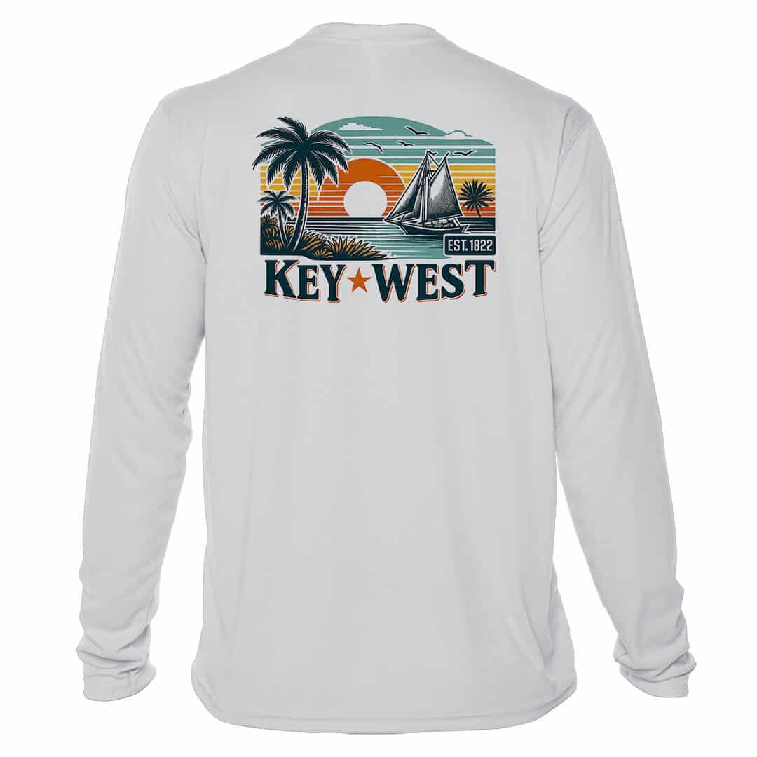 White long sleeve shirt with Key West sunset and sailboat graphic, UPF 50+ protection.