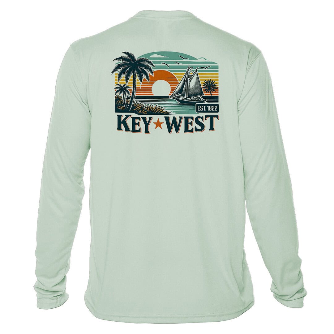 Long sleeve UPF 50+ sun shirt featuring Key West sunset and sailboat graphic.
