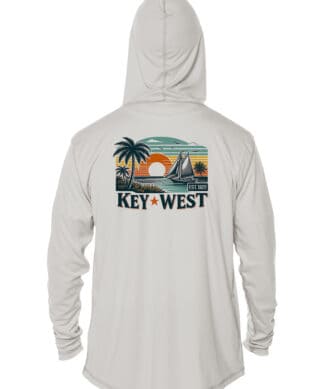 UPF 50+ Key West hoodie with tropical sunset and sailboat graphic, perfect for sun protection and ca.