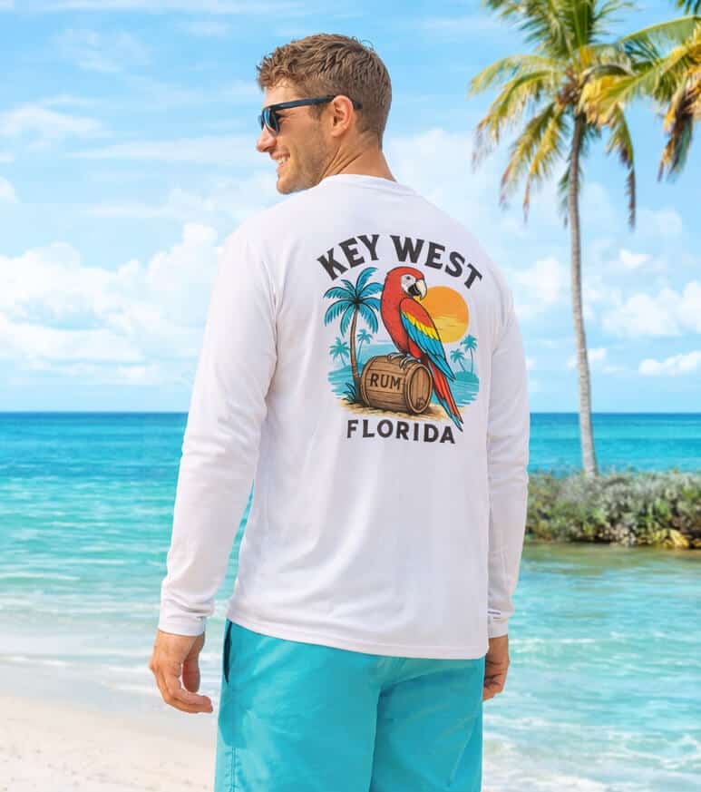 Parrot Party UPF 50+ long sleeve sun shirt with tropical design for sun protection. Perfect for beac.