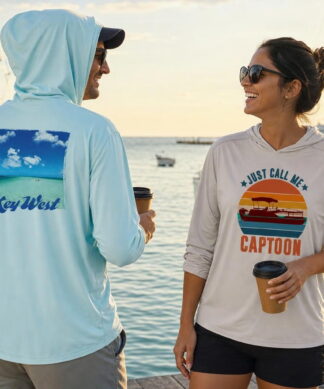 Friends on a Key West dock at sunrise in UPF 50+ sun hoodies